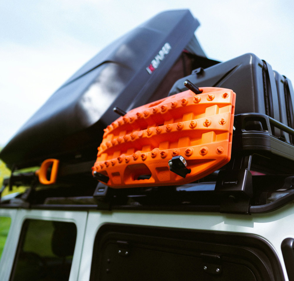 Top 10 Must-Have Accessories for Your 4x4 Adventure recovery tracks on roof rack