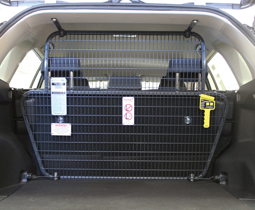 behind second row cargo barrier behind second row cargo barrier