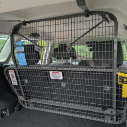 dual position cargo barrier